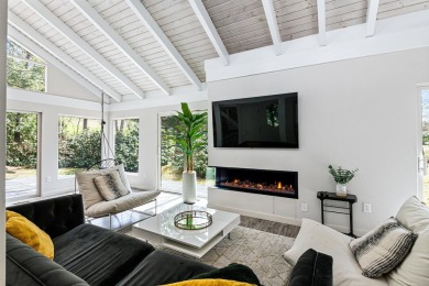 4-bedroom, 3-bath contemporary home on 1.04+/- AC overlooking on Eastman Golf Links in New Hampshire - for sale on GolfHomes.com, golf home, golf lot