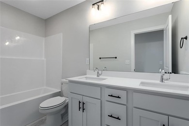 Introducing *Lexington,* an epitome of luxury and functionality on Heritage Park Golf Course in Kansas - for sale on GolfHomes.com, golf home, golf lot