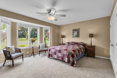 CONTEMPORARY SUMMIT TOWNSHIP END-UNIT CONDO FEATURING MAIN FLOOR on Country Club of Jackson in Michigan - for sale on GolfHomes.com, golf home, golf lot