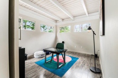 4-bedroom, 3-bath contemporary home on 1.04+/- AC overlooking on Eastman Golf Links in New Hampshire - for sale on GolfHomes.com, golf home, golf lot