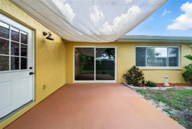 Lovely and spacious, this 2-bedroom, 2-bathroom home with a on Beacon Woods Golf Club in Florida - for sale on GolfHomes.com, golf home, golf lot
