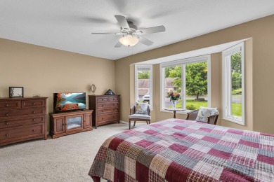 CONTEMPORARY SUMMIT TOWNSHIP END-UNIT CONDO FEATURING MAIN FLOOR on Country Club of Jackson in Michigan - for sale on GolfHomes.com, golf home, golf lot
