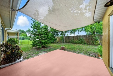 Lovely and spacious, this 2-bedroom, 2-bathroom home with a on Beacon Woods Golf Club in Florida - for sale on GolfHomes.com, golf home, golf lot