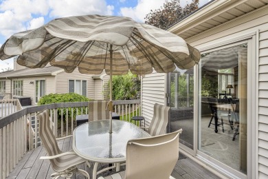 CONTEMPORARY SUMMIT TOWNSHIP END-UNIT CONDO FEATURING MAIN FLOOR on Country Club of Jackson in Michigan - for sale on GolfHomes.com, golf home, golf lot