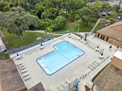 Lovely and spacious, this 2-bedroom, 2-bathroom home with a on Beacon Woods Golf Club in Florida - for sale on GolfHomes.com, golf home, golf lot