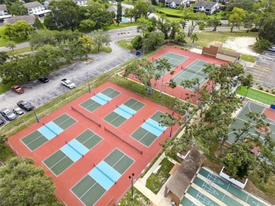Lovely and spacious, this 2-bedroom, 2-bathroom home with a on Beacon Woods Golf Club in Florida - for sale on GolfHomes.com, golf home, golf lot
