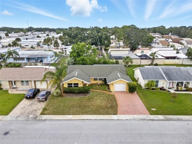 Lovely and spacious, this 2-bedroom, 2-bathroom home with a on Beacon Woods Golf Club in Florida - for sale on GolfHomes.com, golf home, golf lot