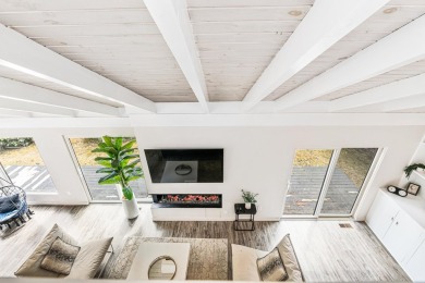 4-bedroom, 3-bath contemporary home on 1.04+/- AC overlooking on Eastman Golf Links in New Hampshire - for sale on GolfHomes.com, golf home, golf lot