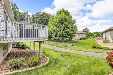CONTEMPORARY SUMMIT TOWNSHIP END-UNIT CONDO FEATURING MAIN FLOOR on Country Club of Jackson in Michigan - for sale on GolfHomes.com, golf home, golf lot