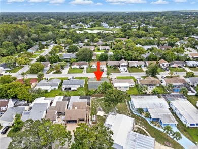 Lovely and spacious, this 2-bedroom, 2-bathroom home with a on Beacon Woods Golf Club in Florida - for sale on GolfHomes.com, golf home, golf lot