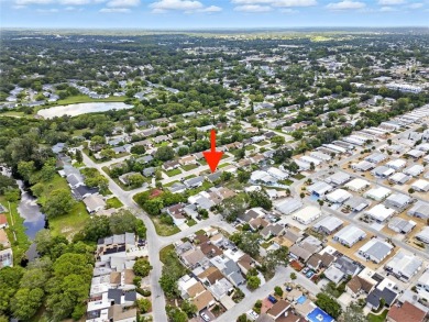 Lovely and spacious, this 2-bedroom, 2-bathroom home with a on Beacon Woods Golf Club in Florida - for sale on GolfHomes.com, golf home, golf lot