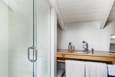 4-bedroom, 3-bath contemporary home on 1.04+/- AC overlooking on Eastman Golf Links in New Hampshire - for sale on GolfHomes.com, golf home, golf lot