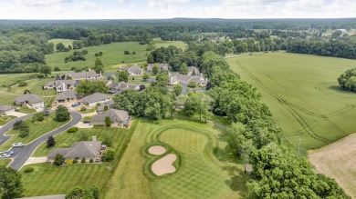 CONTEMPORARY SUMMIT TOWNSHIP END-UNIT CONDO FEATURING MAIN FLOOR on Country Club of Jackson in Michigan - for sale on GolfHomes.com, golf home, golf lot