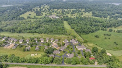 CONTEMPORARY SUMMIT TOWNSHIP END-UNIT CONDO FEATURING MAIN FLOOR on Country Club of Jackson in Michigan - for sale on GolfHomes.com, golf home, golf lot