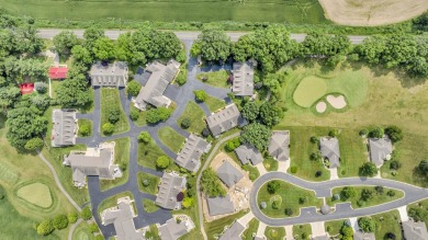 CONTEMPORARY SUMMIT TOWNSHIP END-UNIT CONDO FEATURING MAIN FLOOR on Country Club of Jackson in Michigan - for sale on GolfHomes.com, golf home, golf lot