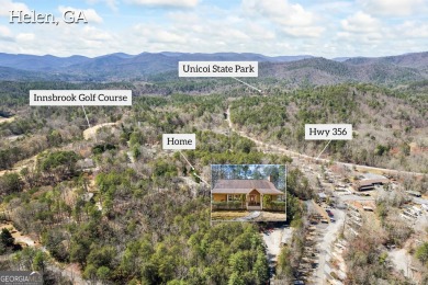 This 5-bedroom, 3-bathroom mountain retreat in the gated on Innsbruck Resort and Golf Club in Georgia - for sale on GolfHomes.com, golf home, golf lot