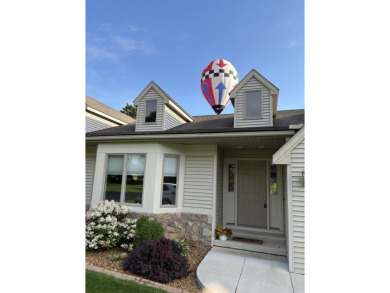 CONTEMPORARY SUMMIT TOWNSHIP END-UNIT CONDO FEATURING MAIN FLOOR on Country Club of Jackson in Michigan - for sale on GolfHomes.com, golf home, golf lot