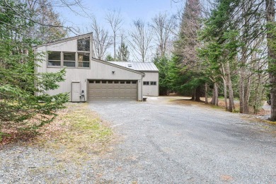 4-bedroom, 3-bath contemporary home on 1.04+/- AC overlooking on Eastman Golf Links in New Hampshire - for sale on GolfHomes.com, golf home, golf lot