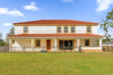 Welcome to this stunning home nestled in the highly sought-after on Wedgefield Golf Club in Florida - for sale on GolfHomes.com, golf home, golf lot