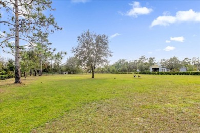 Welcome to this stunning home nestled in the highly sought-after on Wedgefield Golf Club in Florida - for sale on GolfHomes.com, golf home, golf lot