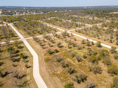 Beautiful 1.5 acre corner lot located in the highly sought after on Pecan Plantation Country Club in Texas - for sale on GolfHomes.com, golf home, golf lot