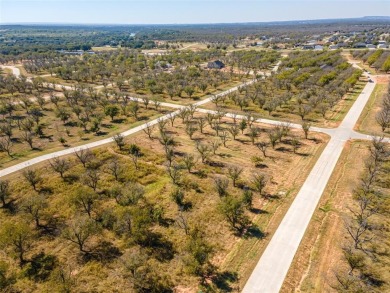 Beautiful 1.5 acre corner lot located in the highly sought after on Pecan Plantation Country Club in Texas - for sale on GolfHomes.com, golf home, golf lot