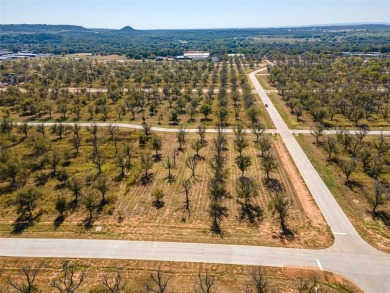 Beautiful 1.5 acre corner lot located in the highly sought after on Pecan Plantation Country Club in Texas - for sale on GolfHomes.com, golf home, golf lot