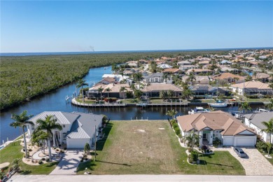 PUNTA GORDA ISLES WATERFRONT LOT - Vacant lot in PGI w/concrete on Saint Andrews South Golf Club in Florida - for sale on GolfHomes.com, golf home, golf lot