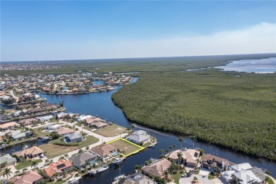 PUNTA GORDA ISLES WATERFRONT LOT - Vacant lot in PGI w/concrete on Saint Andrews South Golf Club in Florida - for sale on GolfHomes.com, golf home, golf lot