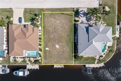 PUNTA GORDA ISLES WATERFRONT LOT - Vacant lot in PGI w/concrete on Saint Andrews South Golf Club in Florida - for sale on GolfHomes.com, golf home, golf lot