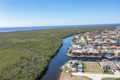 PUNTA GORDA ISLES WATERFRONT LOT - Vacant lot in PGI w/concrete on Saint Andrews South Golf Club in Florida - for sale on GolfHomes.com, golf home, golf lot