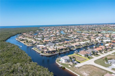 PUNTA GORDA ISLES WATERFRONT LOT - Vacant lot in PGI w/concrete on Saint Andrews South Golf Club in Florida - for sale on GolfHomes.com, golf home, golf lot