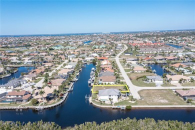 PUNTA GORDA ISLES WATERFRONT LOT - Vacant lot in PGI w/concrete on Saint Andrews South Golf Club in Florida - for sale on GolfHomes.com, golf home, golf lot
