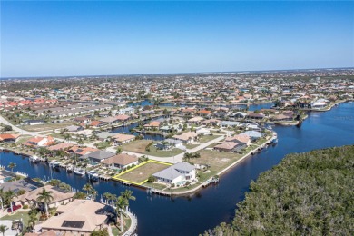 PUNTA GORDA ISLES WATERFRONT LOT - Vacant lot in PGI w/concrete on Saint Andrews South Golf Club in Florida - for sale on GolfHomes.com, golf home, golf lot