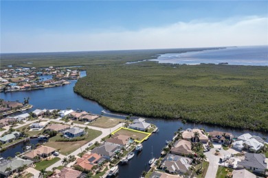 PUNTA GORDA ISLES WATERFRONT LOT - Vacant lot in PGI w/concrete on Saint Andrews South Golf Club in Florida - for sale on GolfHomes.com, golf home, golf lot