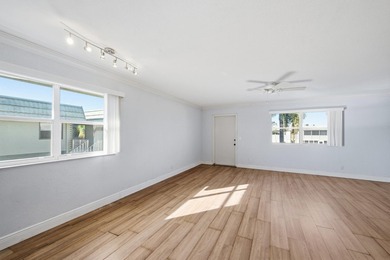 WELCOME TO THIS AMAZING LAKEVIEW IN MONACO! Resortstyle 55+ on Kings Point Golf -Flanders Way in Florida - for sale on GolfHomes.com, golf home, golf lot