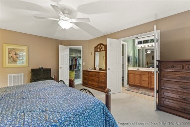 Beautiful 3-bedroom, 2-bath home with a finished bonus room over on Carolina Trace Country Club in North Carolina - for sale on GolfHomes.com, golf home, golf lot