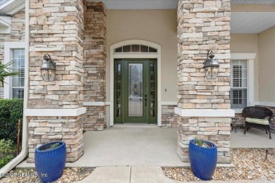 Welcome to this absolutely stunning, model-quality David Weekley on St. Johns Golf and Country Club in Florida - for sale on GolfHomes.com, golf home, golf lot