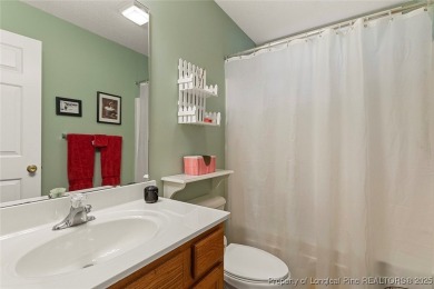 Beautiful 3-bedroom, 2-bath home with a finished bonus room over on Carolina Trace Country Club in North Carolina - for sale on GolfHomes.com, golf home, golf lot