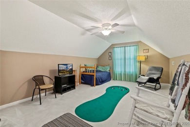 Beautiful 3-bedroom, 2-bath home with a finished bonus room over on Carolina Trace Country Club in North Carolina - for sale on GolfHomes.com, golf home, golf lot
