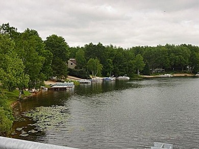 Welcome to the 18th hole of the Royal golf course. Enjoy a on Canadian Lakes Country Club-The Royal Course in Michigan - for sale on GolfHomes.com, golf home, golf lot