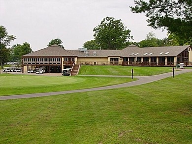 Welcome to the 18th hole of the Royal golf course. Enjoy a on Canadian Lakes Country Club-The Royal Course in Michigan - for sale on GolfHomes.com, golf home, golf lot