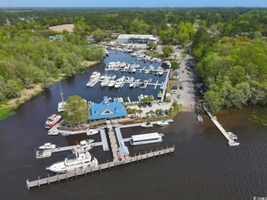 Welcome to this stunning 5-bedroom residence in the highly on TPC Myrtle Beach Golf Club in South Carolina - for sale on GolfHomes.com, golf home, golf lot