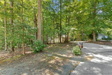 Beautiful 3-bedroom, 2-bath home with a finished bonus room over on Carolina Trace Country Club in North Carolina - for sale on GolfHomes.com, golf home, golf lot