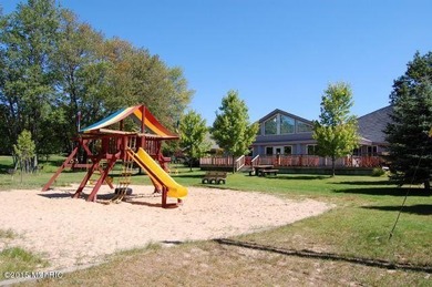 Welcome to the 18th hole of the Royal golf course. Enjoy a on Canadian Lakes Country Club-The Royal Course in Michigan - for sale on GolfHomes.com, golf home, golf lot