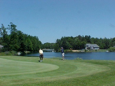 Welcome to the 18th hole of the Royal golf course. Enjoy a on Canadian Lakes Country Club-The Royal Course in Michigan - for sale on GolfHomes.com, golf home, golf lot