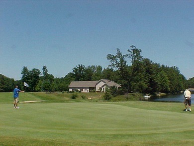 Welcome to the 18th hole of the Royal golf course. Enjoy a on Canadian Lakes Country Club-The Royal Course in Michigan - for sale on GolfHomes.com, golf home, golf lot