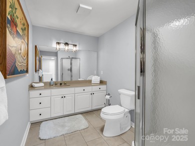 Beautiful resort home on 2.4 private wooded acres within minutes on Rumbling Bald Resort on Lake Lure in North Carolina - for sale on GolfHomes.com, golf home, golf lot