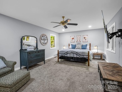 Beautiful resort home on 2.4 private wooded acres within minutes on Rumbling Bald Resort on Lake Lure in North Carolina - for sale on GolfHomes.com, golf home, golf lot