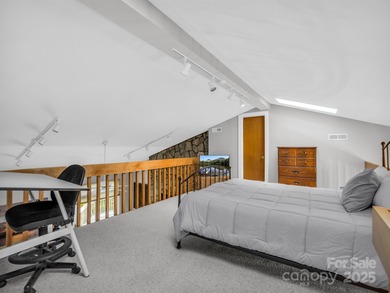 Beautiful resort home on 2.4 private wooded acres within minutes on Rumbling Bald Resort on Lake Lure in North Carolina - for sale on GolfHomes.com, golf home, golf lot